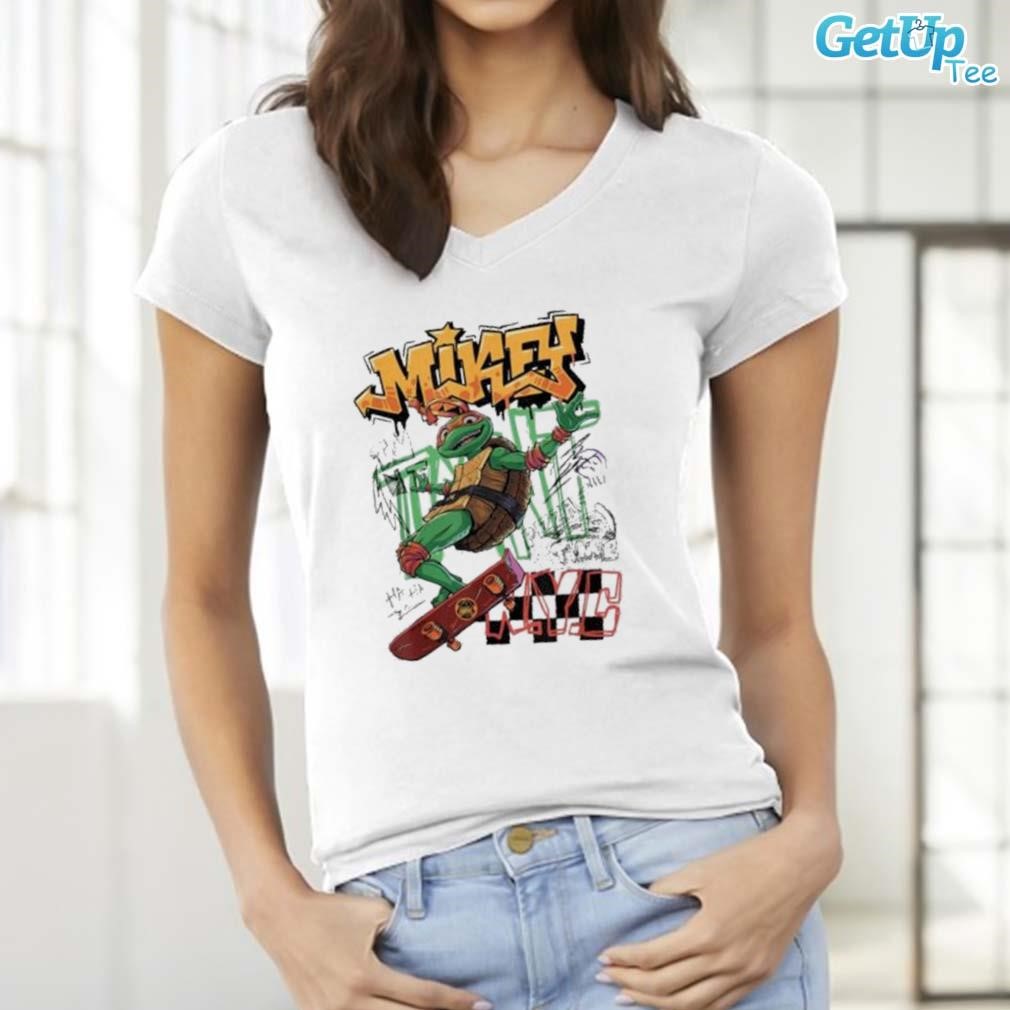 https://images.getuptee.com/2023/07/Limited-Teenage-mutant-ninja-turtles-mutant-mayhem-skater-mikey-art-design-ladies-tee.jpg